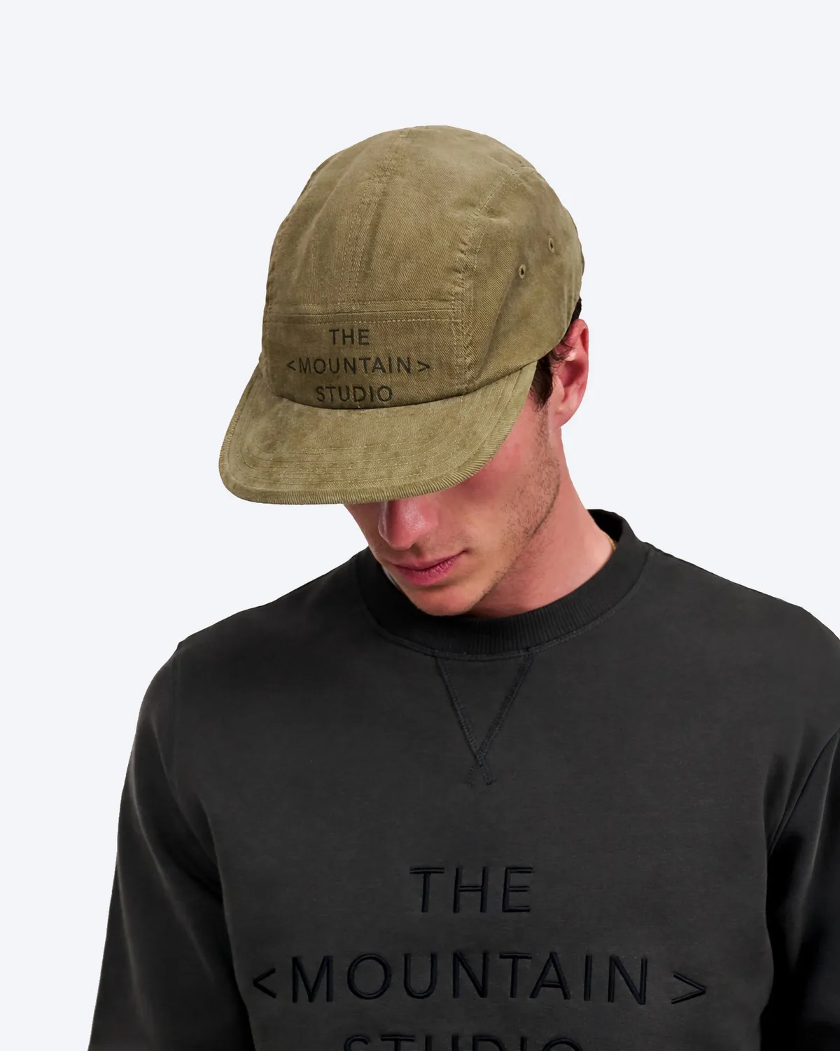The Mountain Studio C-18 caps kordfløyel grønn