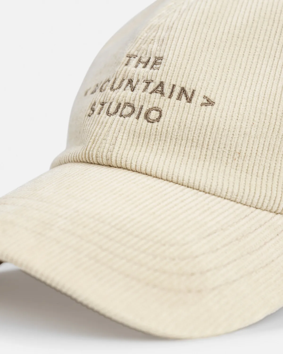 The Mountain Studio C-10 Cord Classic caps almond milk kord