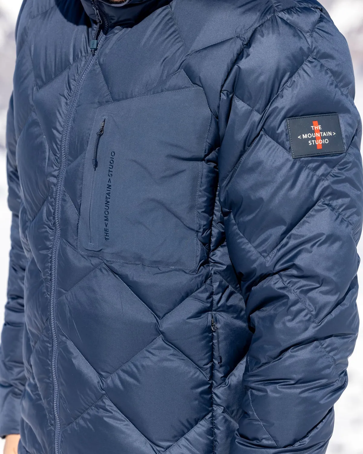 The Mountain Studio D-7 UL dunjakke Brindle med hette