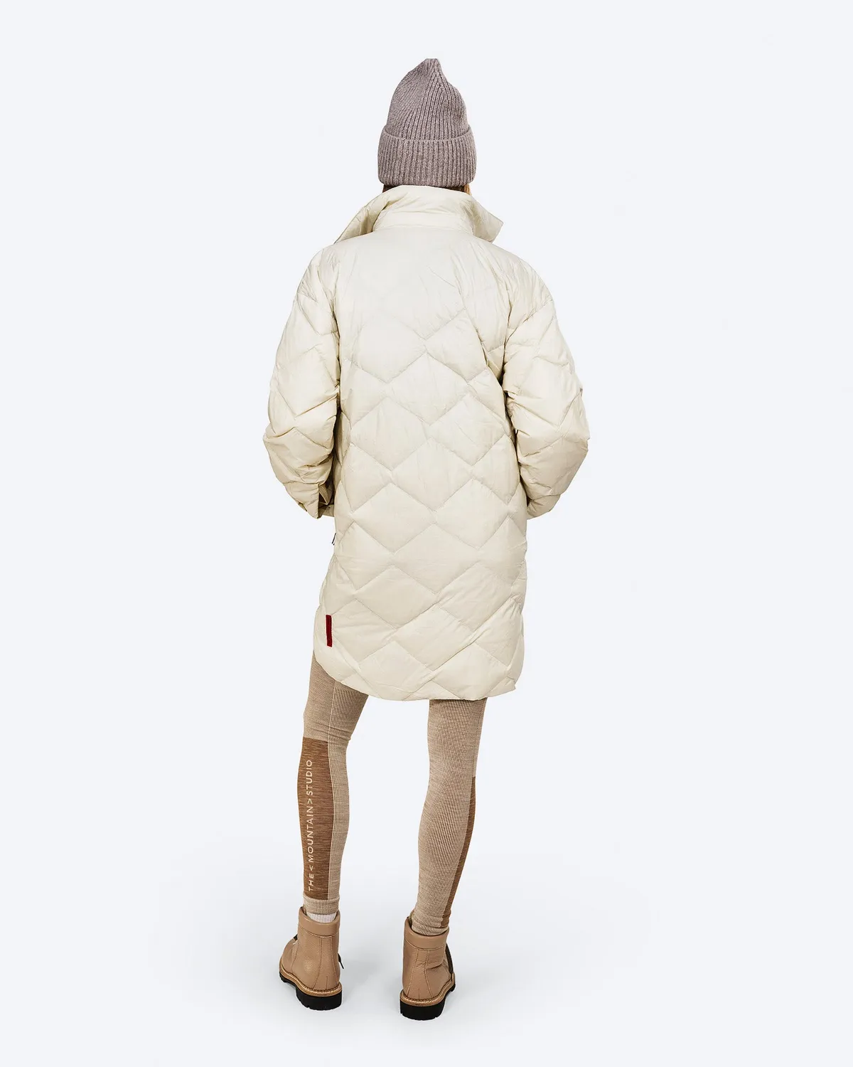 The Mountain Studio G-14 WUL dunjakke Almond Milk lett