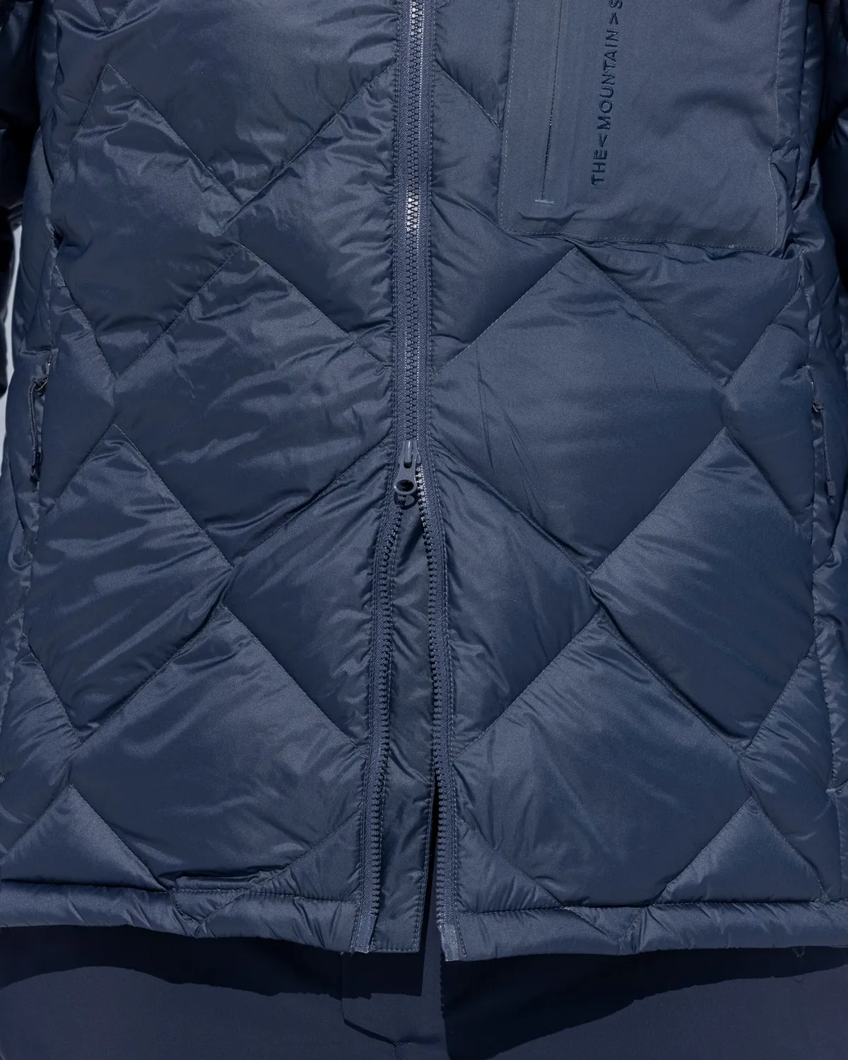 The Mountain Studio D-7 UL dunjakke Brindle med hette