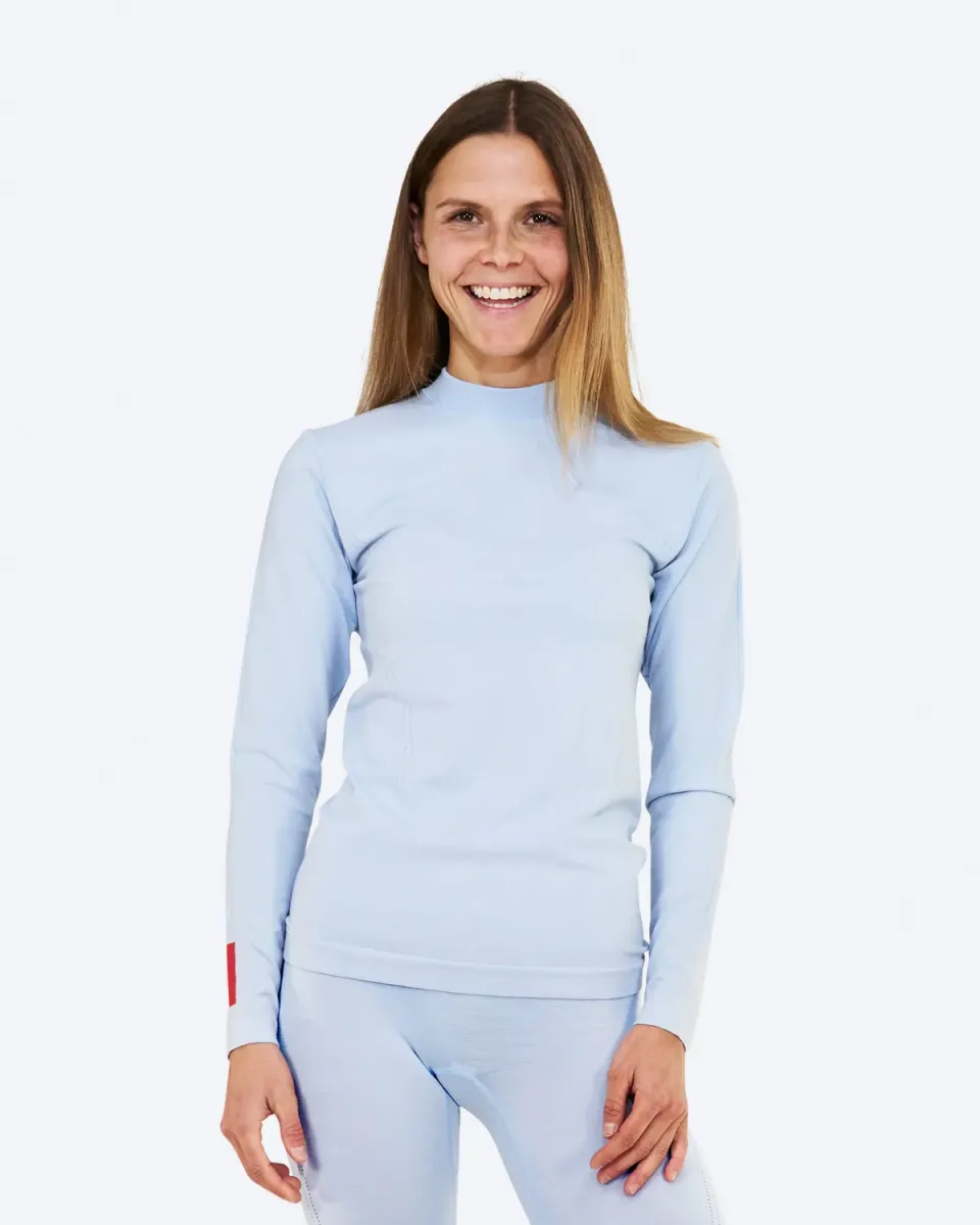 The Mountain Studio U-9 W Seamless Merino undertrøye Ice Water tettsittende