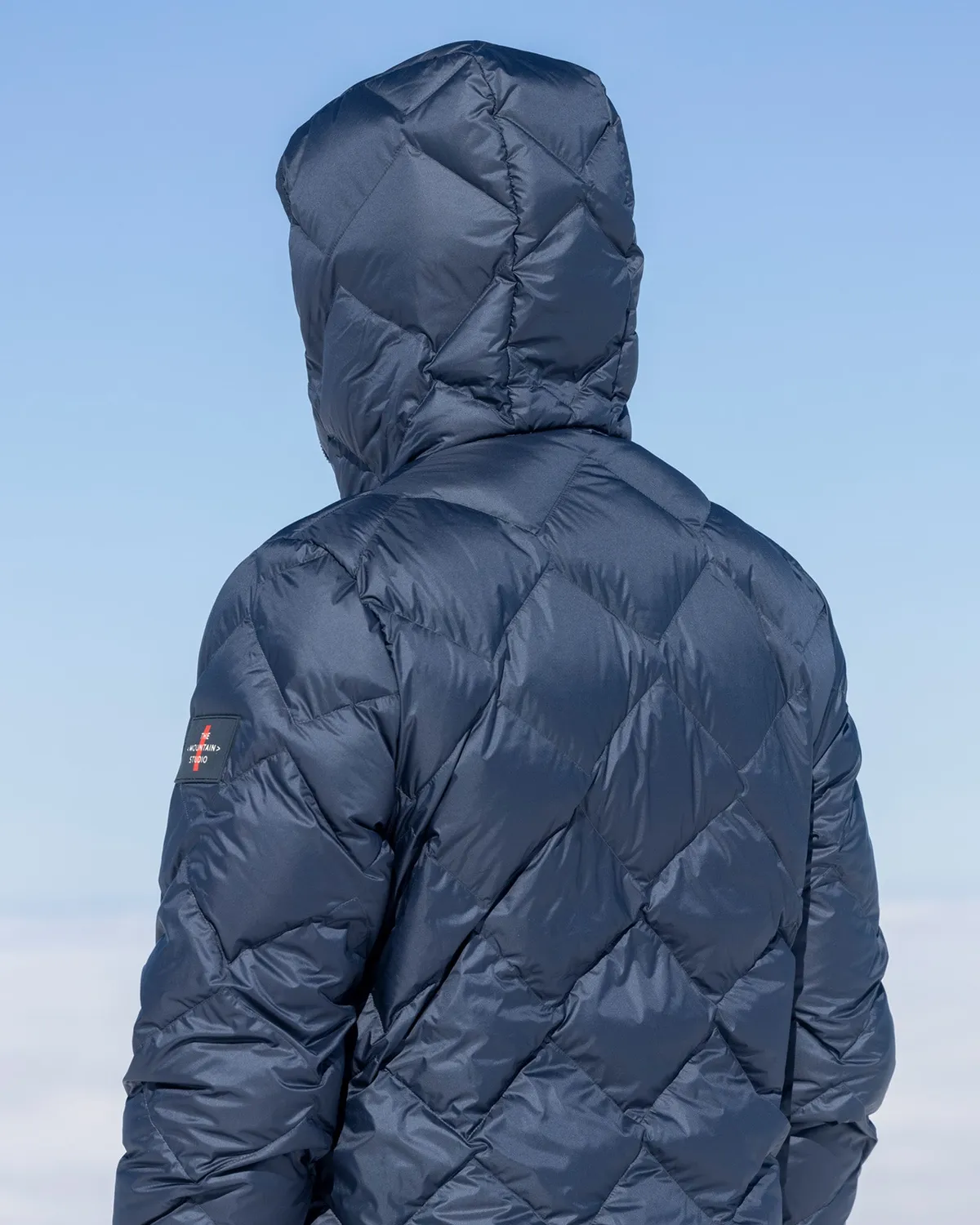 The Mountain Studio D-7 UL dunjakke Brindle med hette
